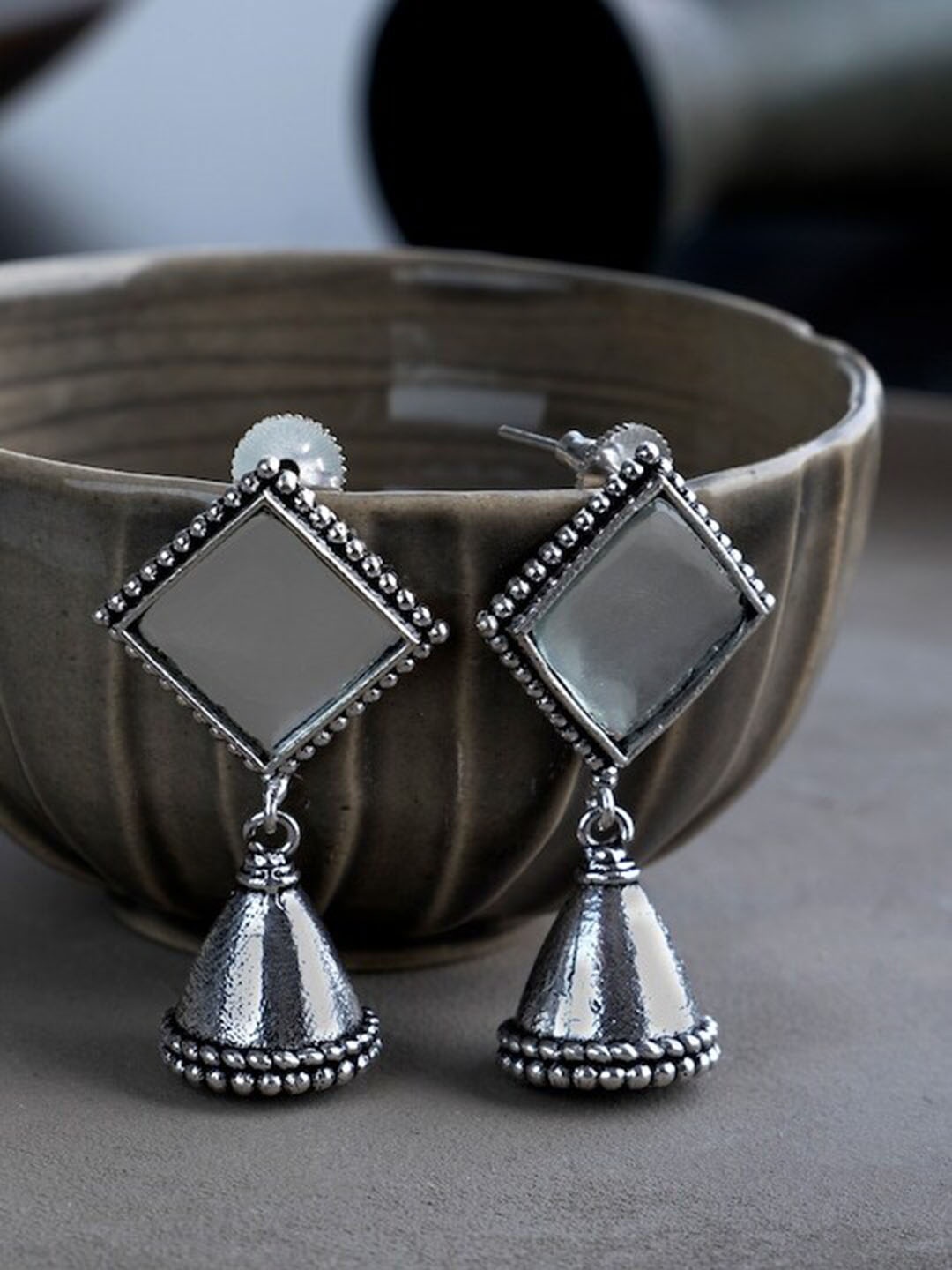 

Infuzze Silver-Plated Geometric Jhumkas Earrings