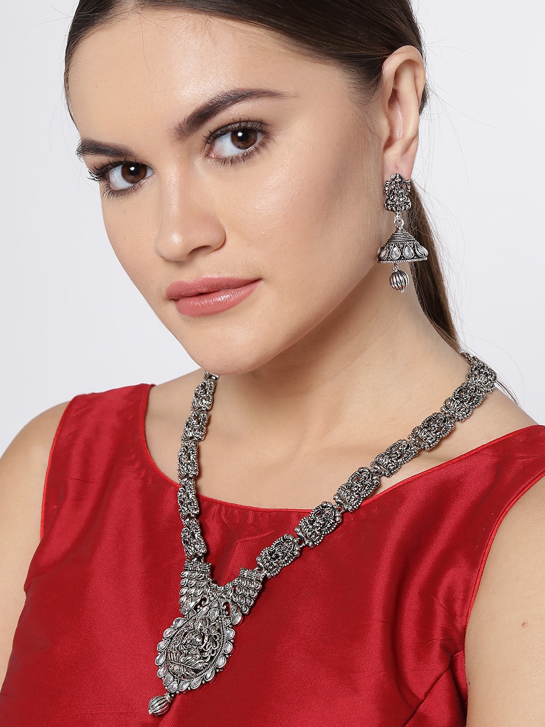 

Zaveri Pearls Oxidised Silver-Toned Goddess Lakshmi-Textured Stone-Studded Jewellery Set