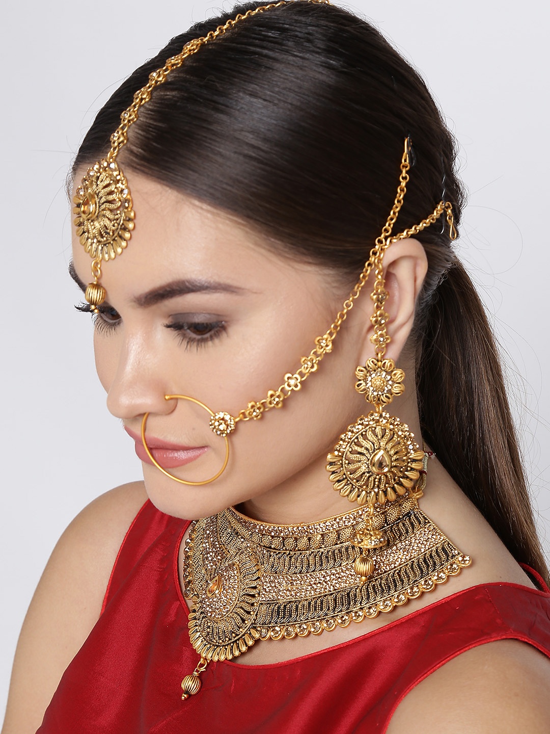 

Zaveri Pearls Antique Gold-Toned Stone-Studded Jewellery Set