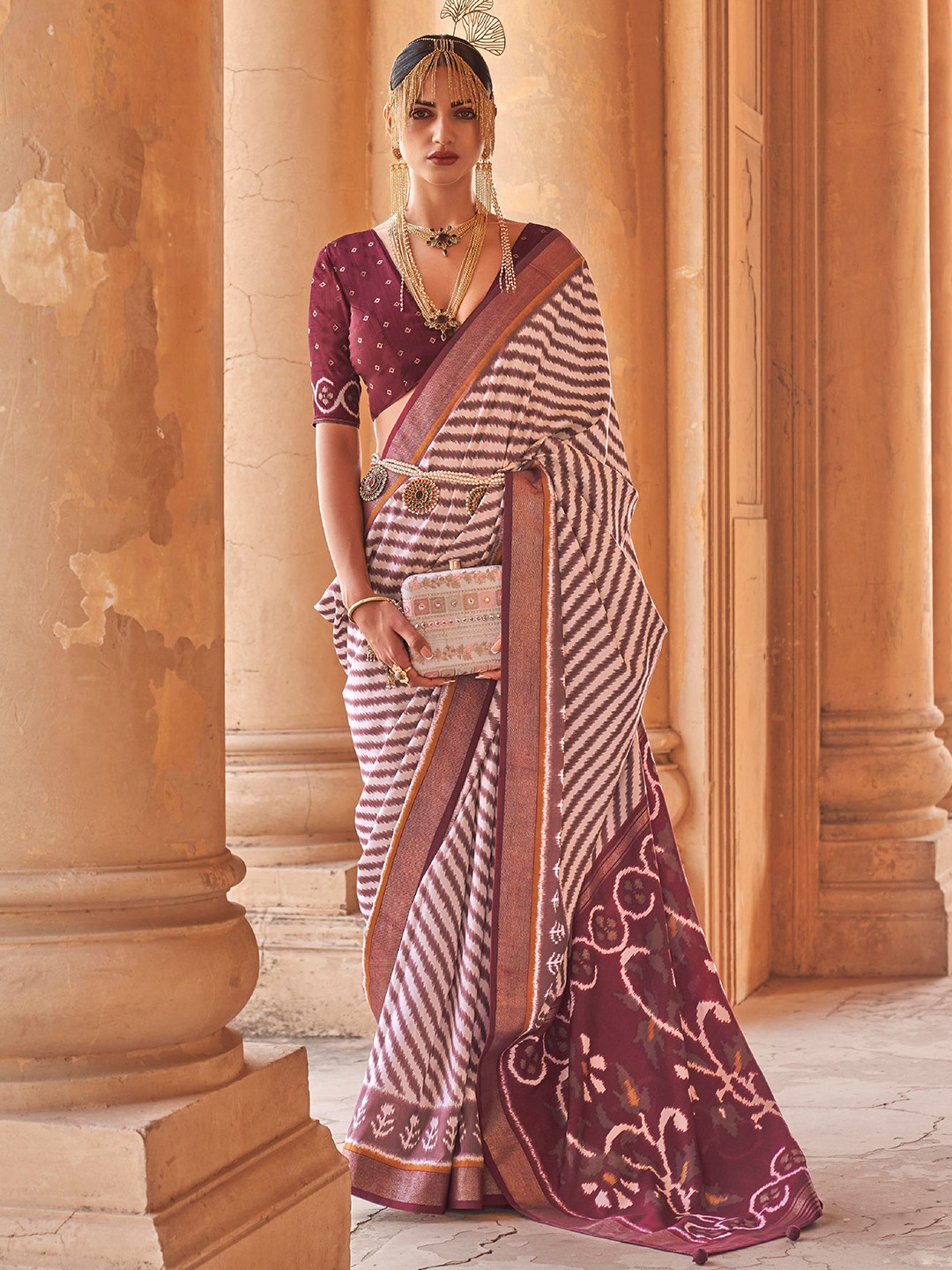 

Mitera Maroon & White Leheriya Zari Patola Saree