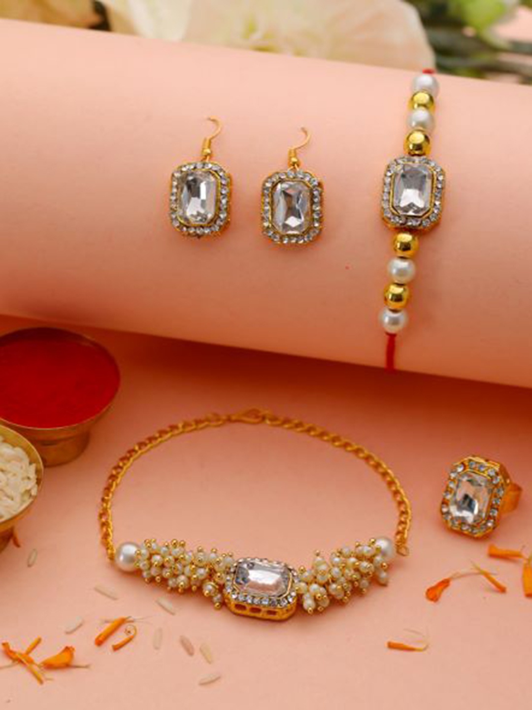 

Jazz and Sizzle Set Of 2 Kundan Studded & Pearl Beaded Rakhis & Ring With Earrings, Gold