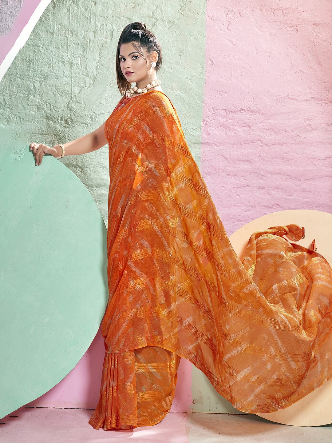 

Triveni Printed Pure Chiffon Tasselled Saree, Orange