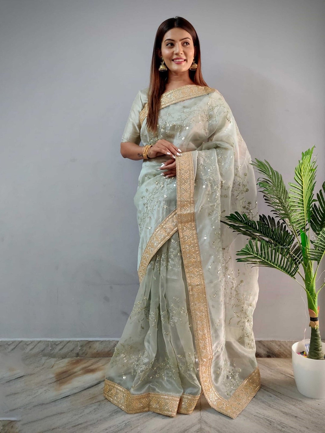 

Mitera Green & Gold-Toned Embellished Sequinned Organza Saree