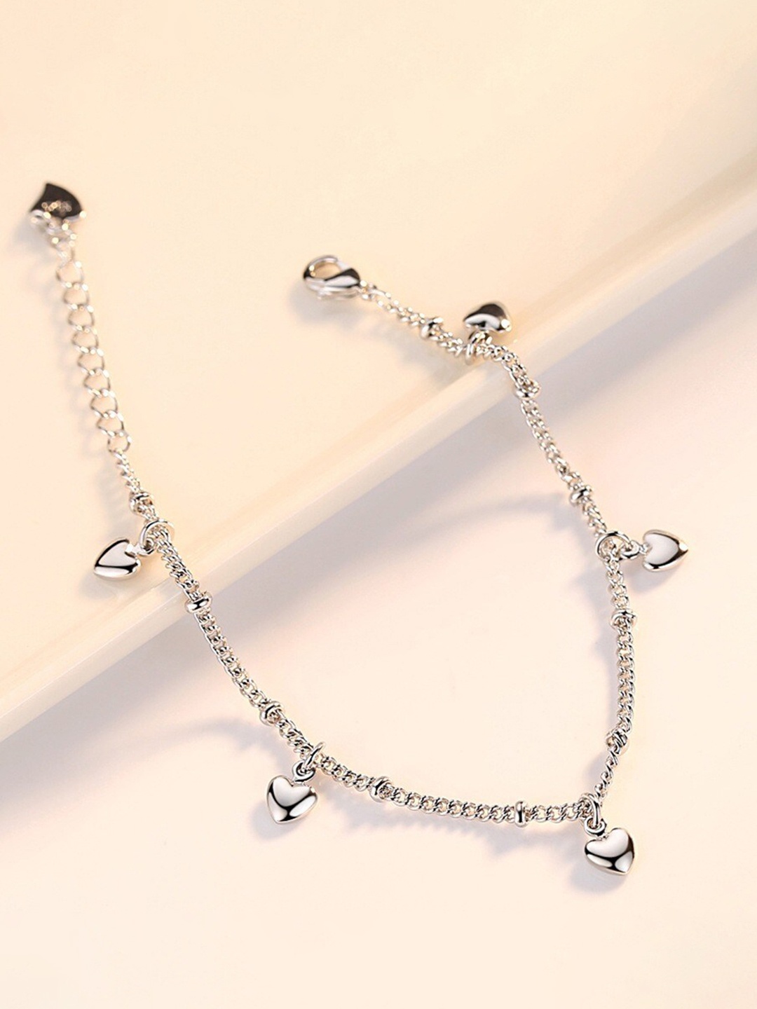 

MYKI Women Cubic Zirconia Silver-Plated Charm Bracelet