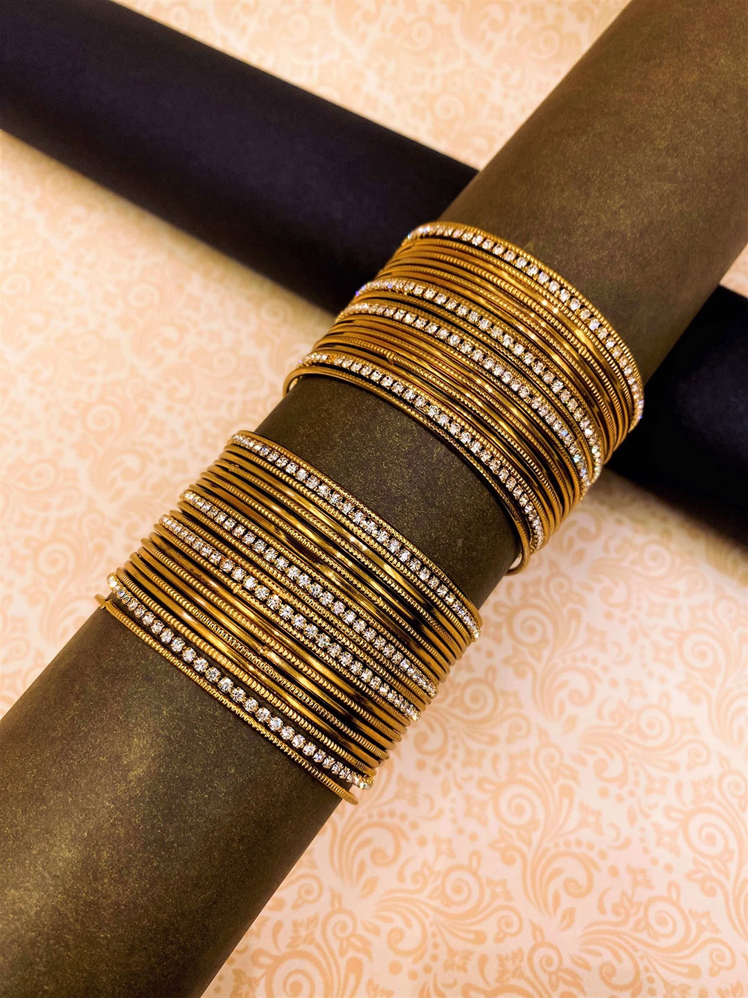 

ATIBELLE Set Of 44 Gold-Plated & Crystal Stone-Studded Textured Bangles