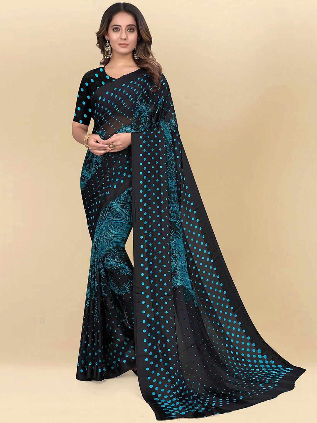 

Mitera Turquoise Blue & Black Ethnic Motif Poly Chiffon Saree With Blouse Piece
