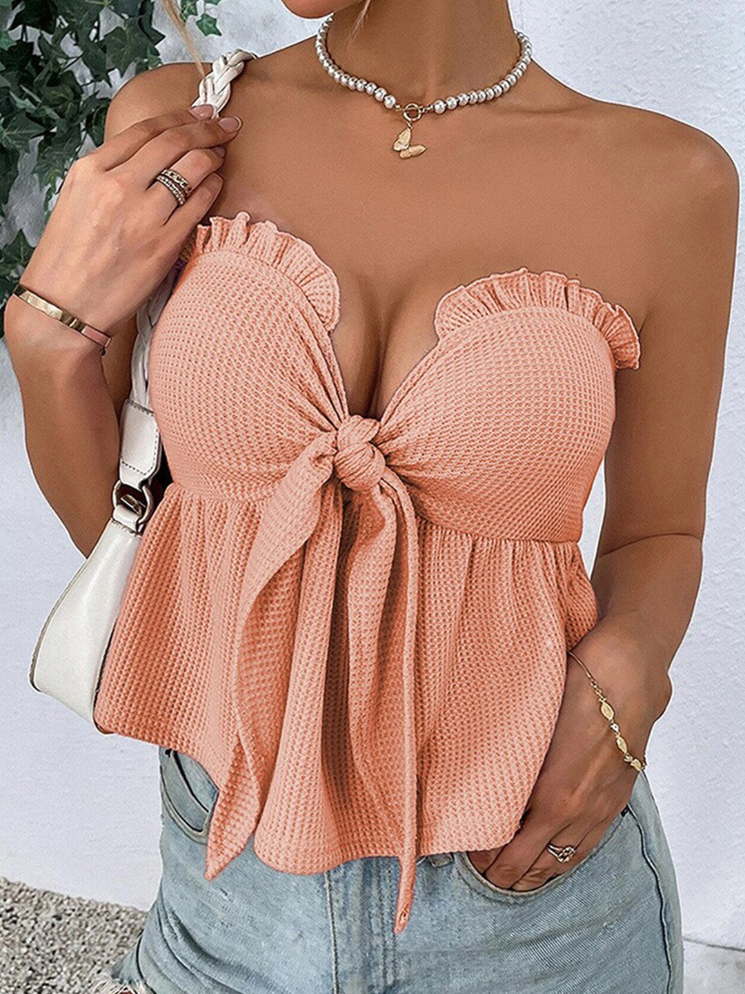 

StyleCast Peach Self Design Strapless Crop Top