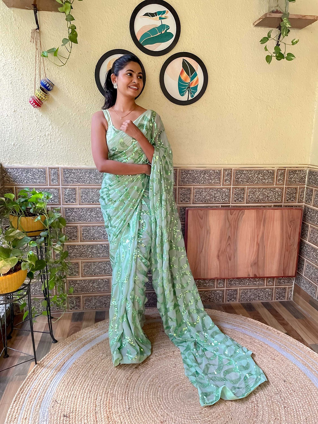 

Mitera Sea Green Embellished Sequinned Saree
