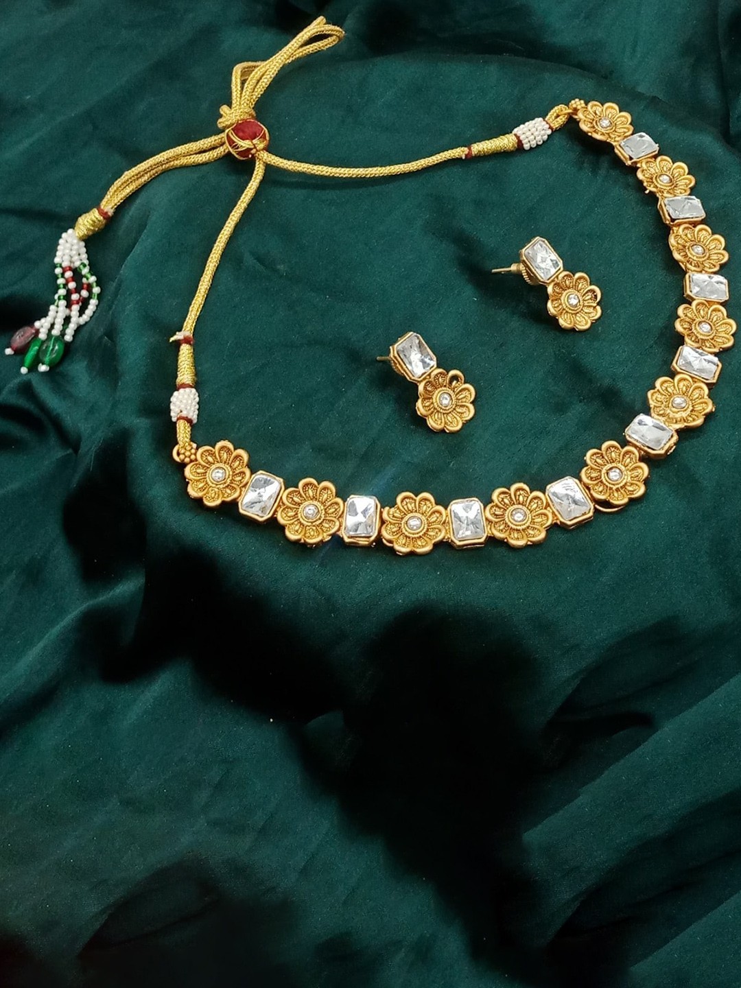 

AASHISH IMITATION Gold-Plated Kundan Studded Jewellery Set