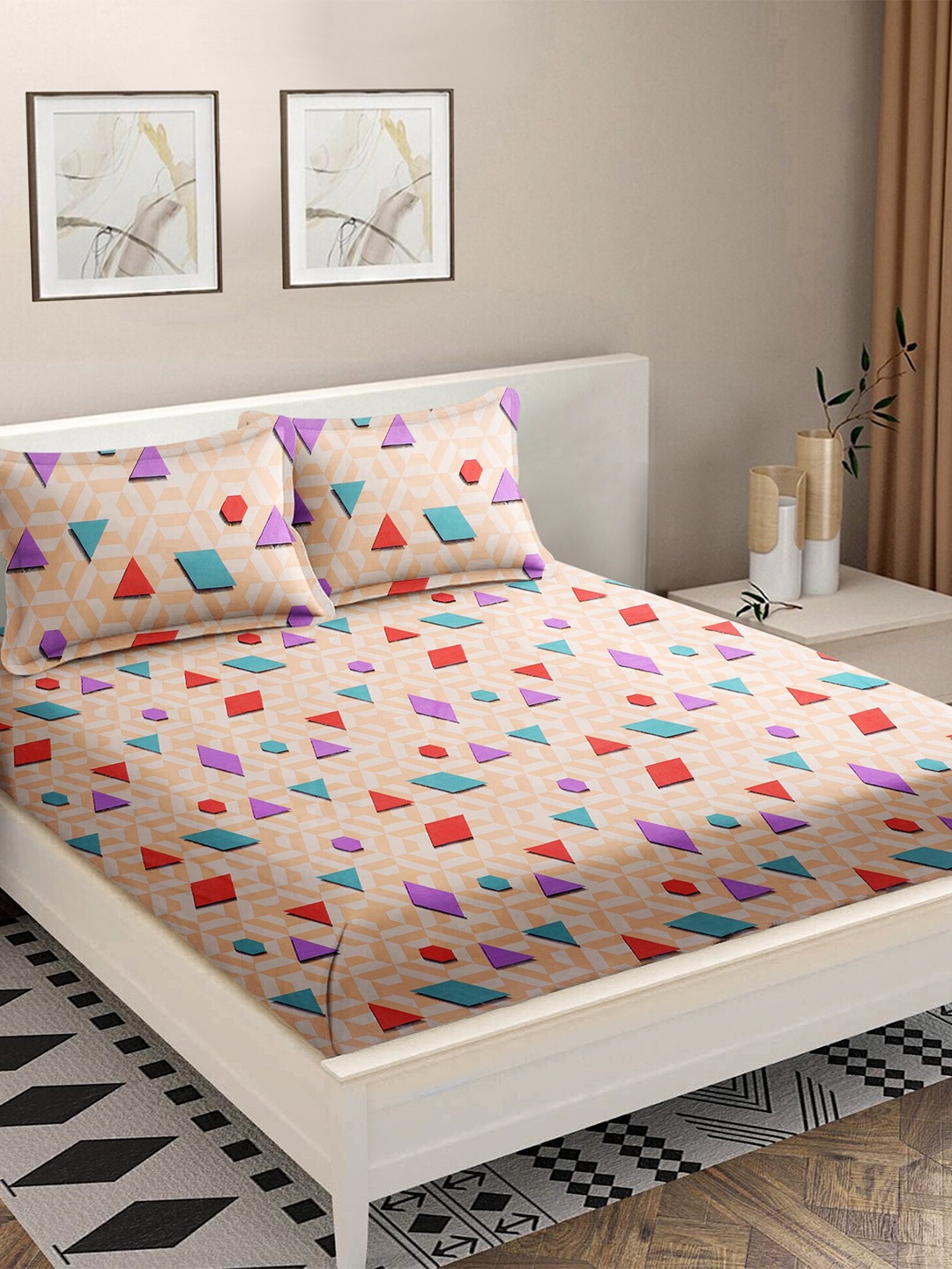 

MODEFE Peach-Coloured & Purple Geometric 180 TC Cotton Queen Bedsheet With 2 Pillow Covers