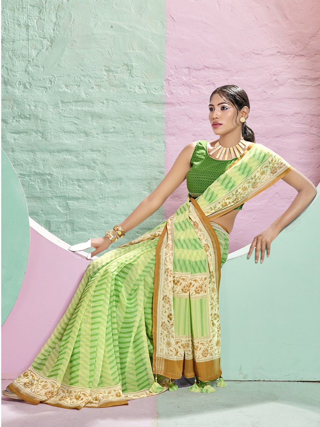 

Triveni Striped Embroidered Pure Georgette Saree, Green