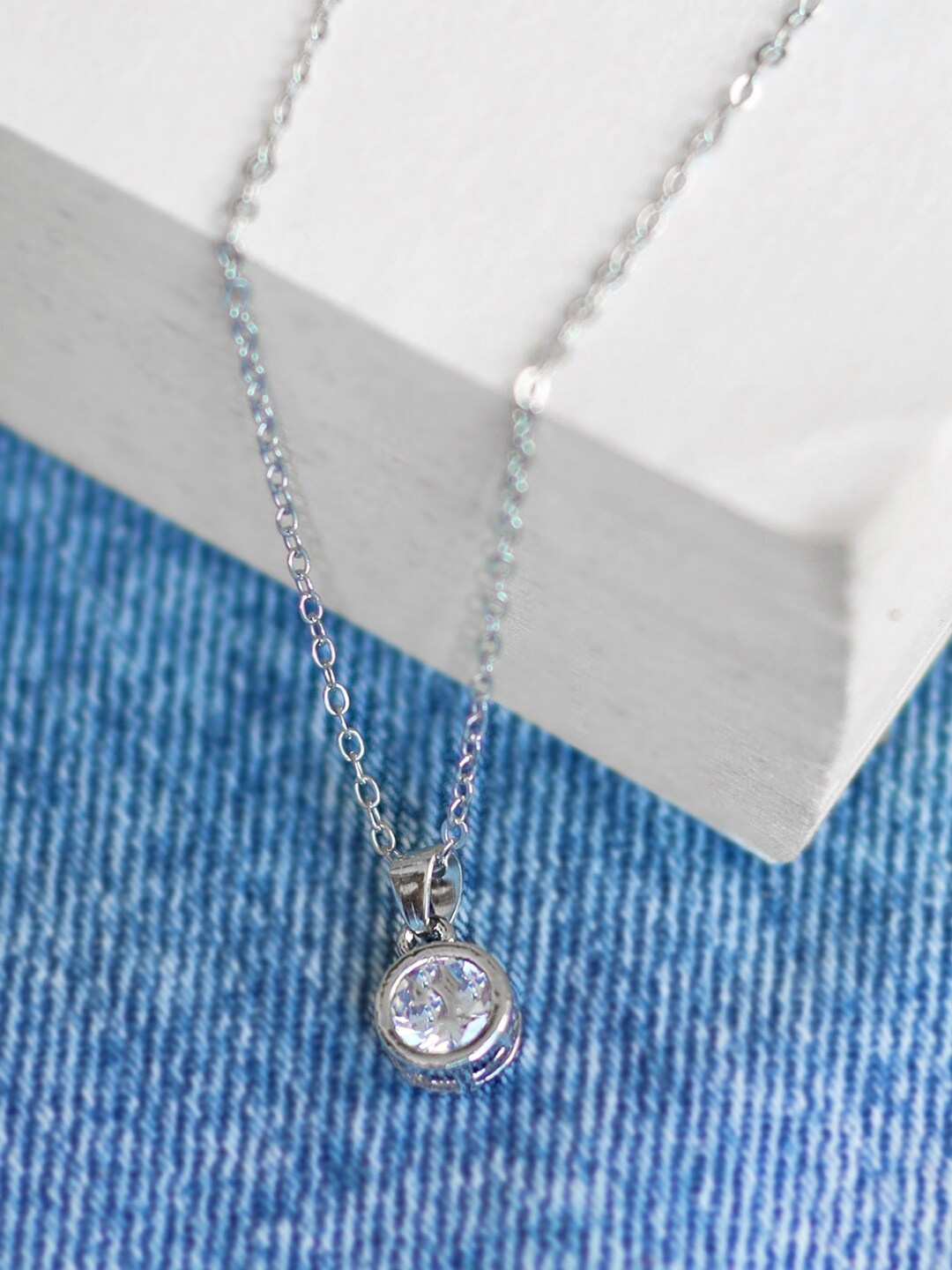 

Ayesha Silver-Plated Stone-Studded Pendant With Chain