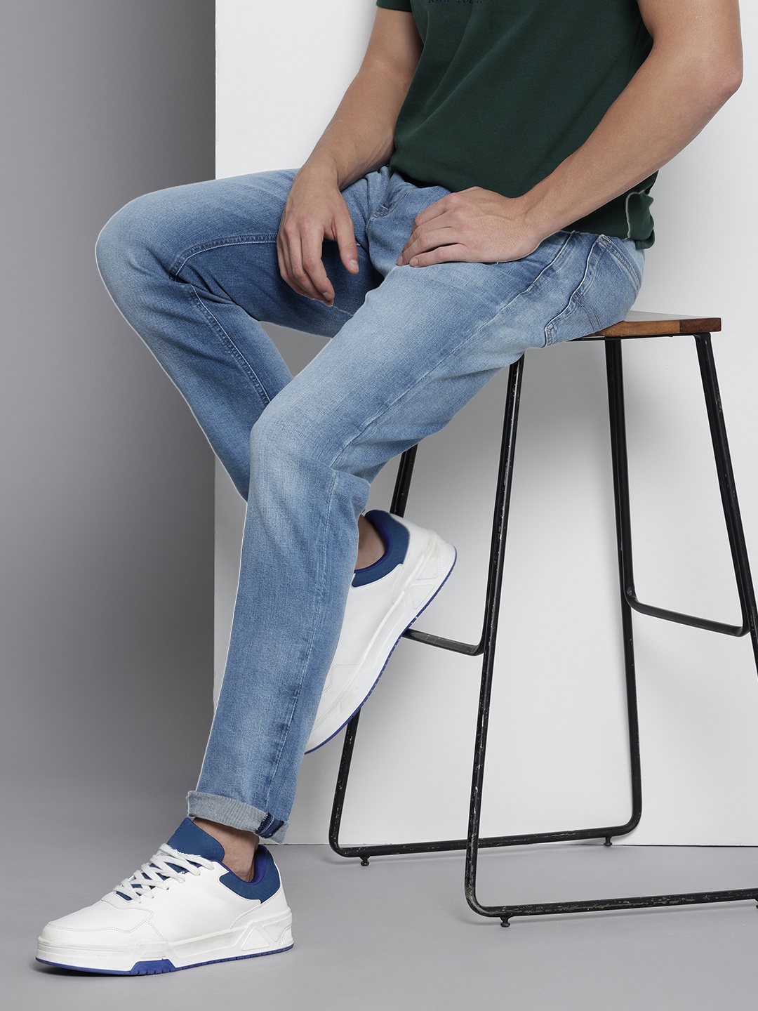 

Tommy Hilfiger Men Austin Slim Tapered Fit Heavy Fade Stretchable Jeans, Blue