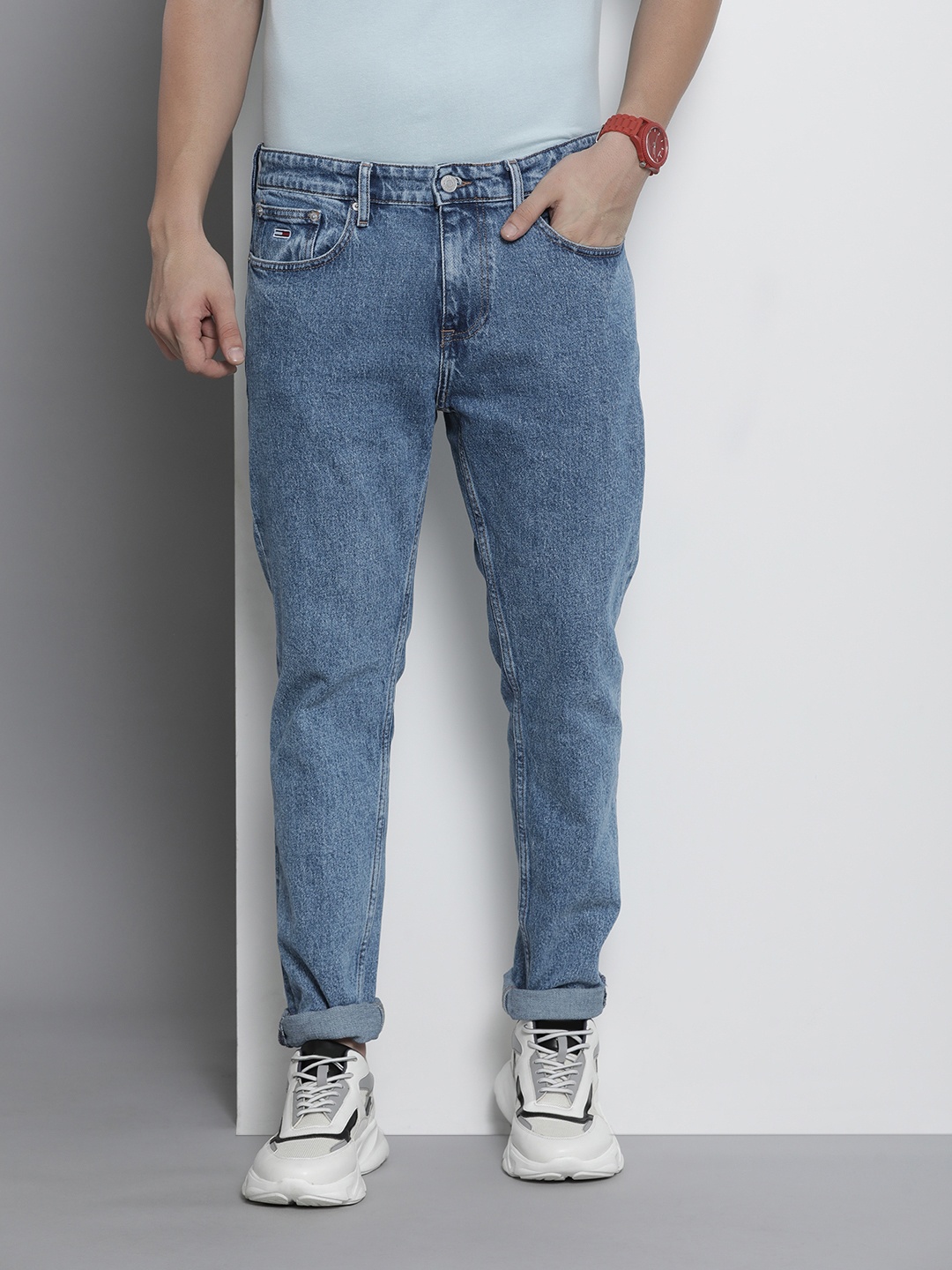 

Tommy Hilfiger Men Slim Fit Heavy Fade Stretchable Mid-Rise Jeans, Blue