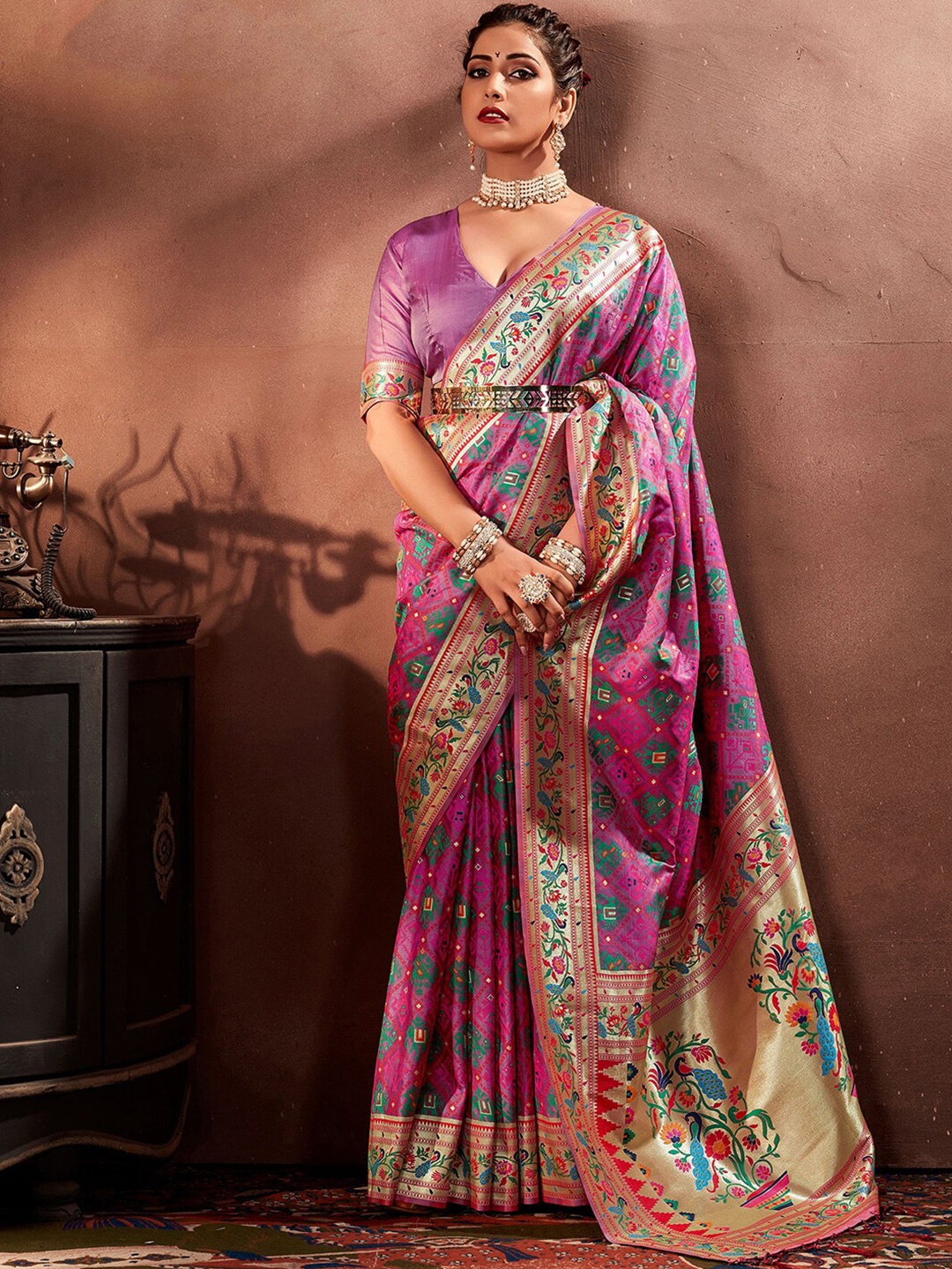 

Mitera Purple & Pink Ethnic Motifs Woven Design Zari Paithani Saree