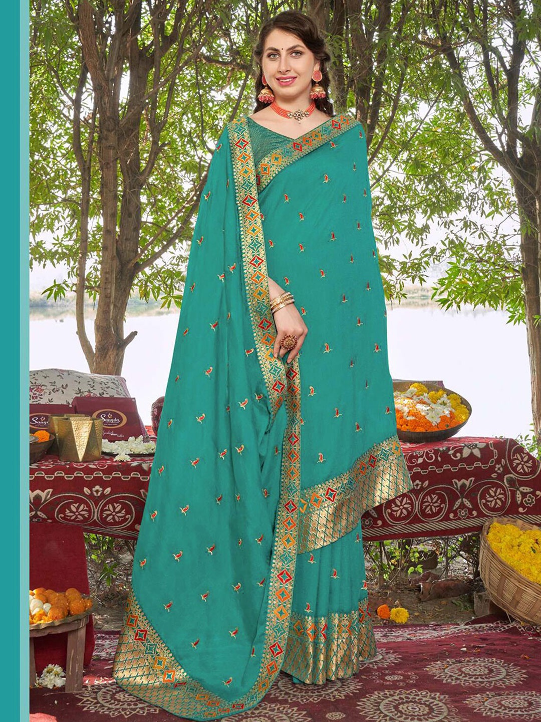 

Mitera Ethnic Motifs Embroidered Zari Art Silk Saree, Green