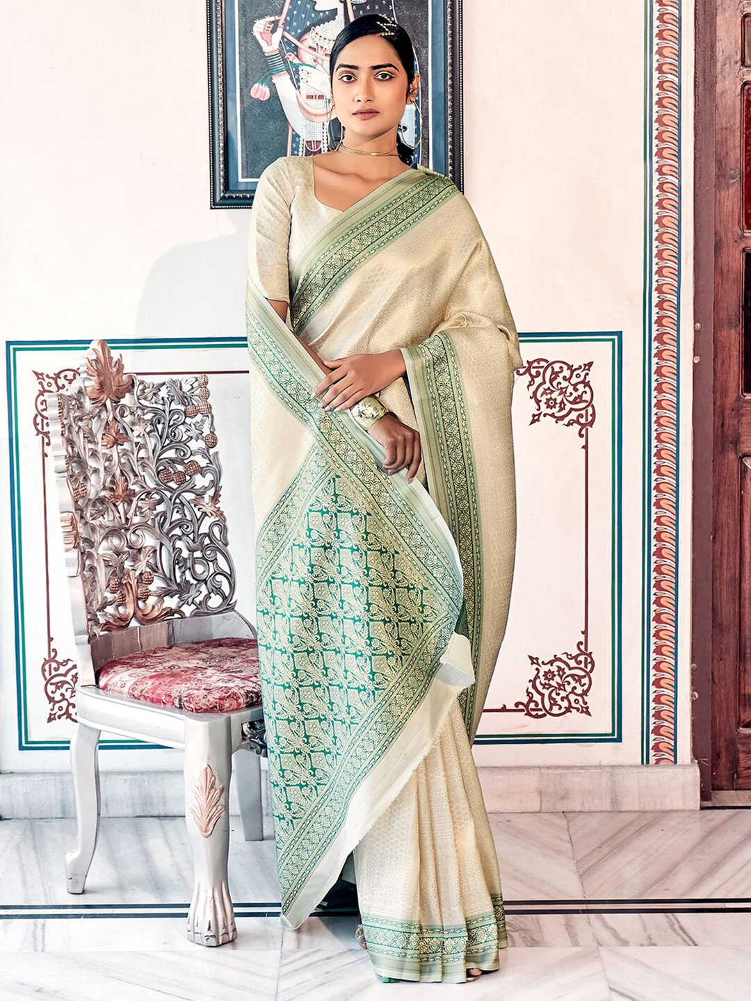 

Mitera White & Green Woven Design Zari Art Silk Kanjeevaram Saree