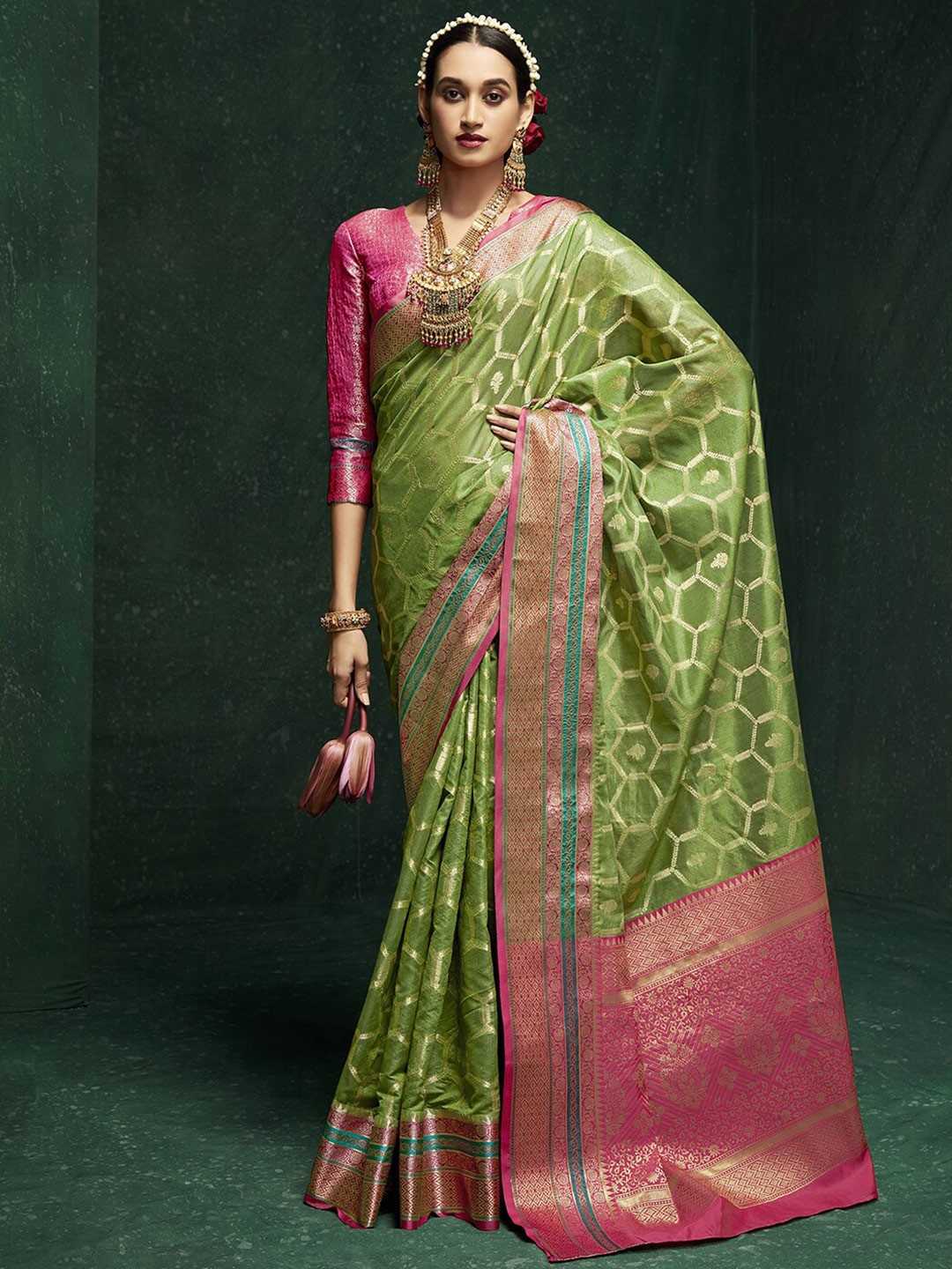 

Mitera Green Ethnic Motif Woven Design Zari Banarasi Saree