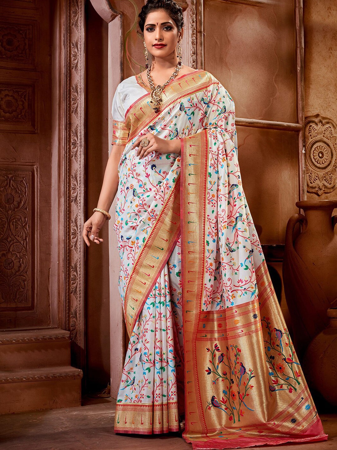 

Mitera White & Red Ethnic Motifs Woven Design Zari Paithani Saree