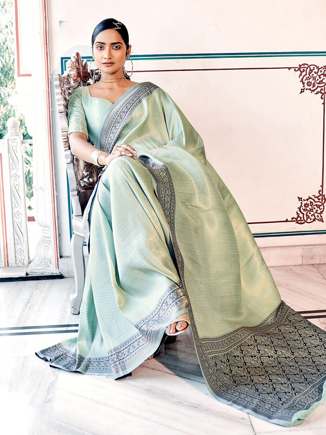 

Mitera Sea Green & Gold-Toned Ethnic Motifs Woven Design Zari Art Silk Kanjeevaram Saree