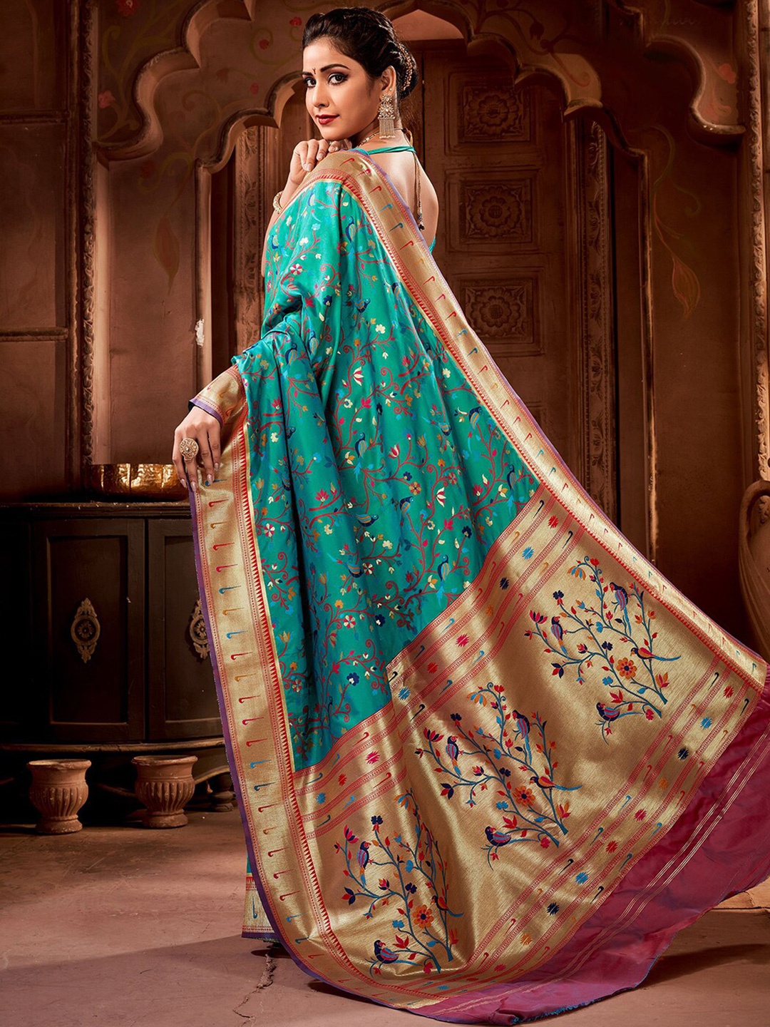 

Mitera Green & Purple Floral Woven Design Zari Art Silk Paithani Saree