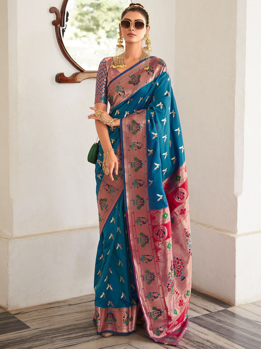

Mitera Blue & Pink Ethnic Motif Zari Art Silk Paithani Saree With Blouse Piece