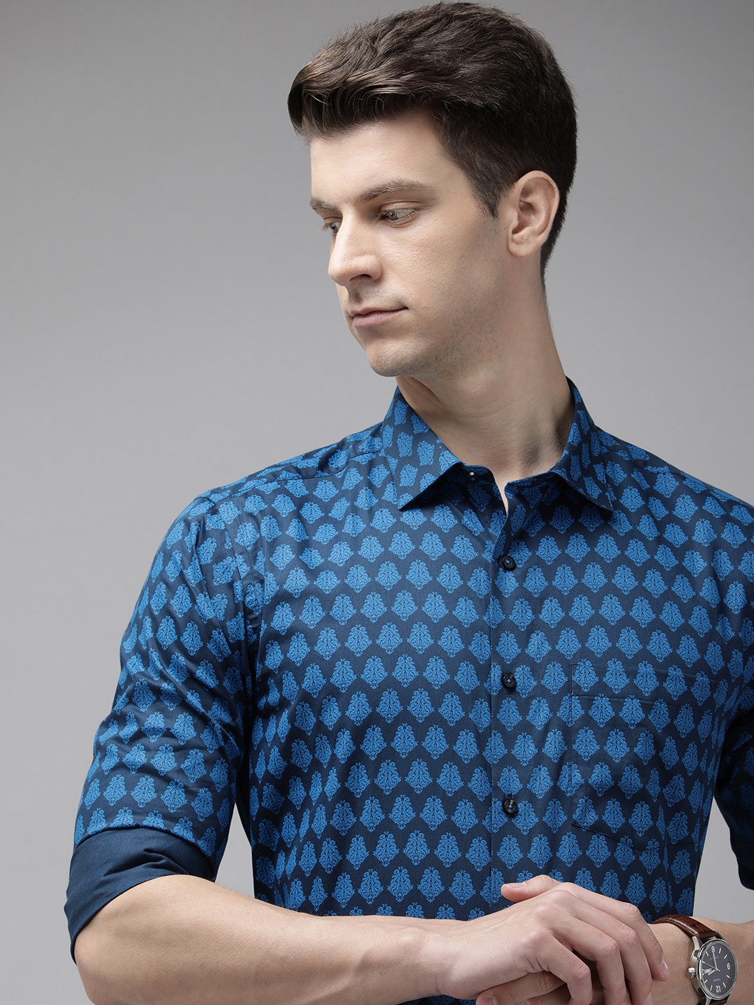 

Park Avenue Pure Cotton Slim Fit Ethnic Motifs Printed Formal Shirt, Blue