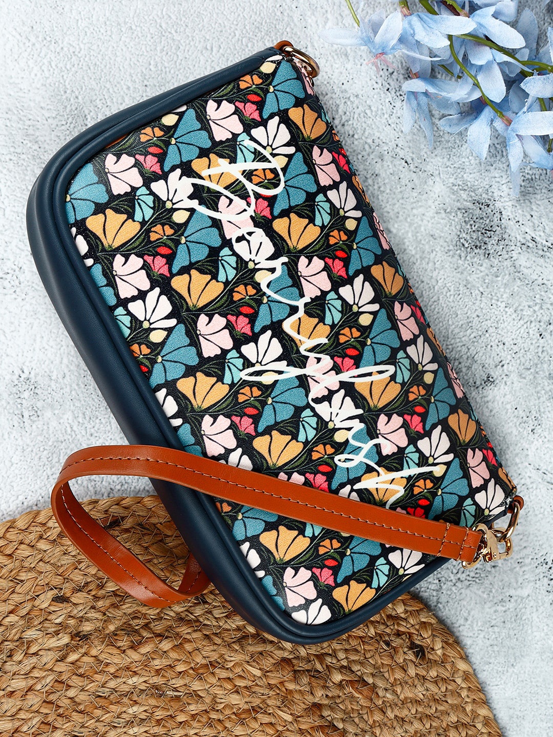 

Berrylush Navy Blue Floral Printed Handheld Bag