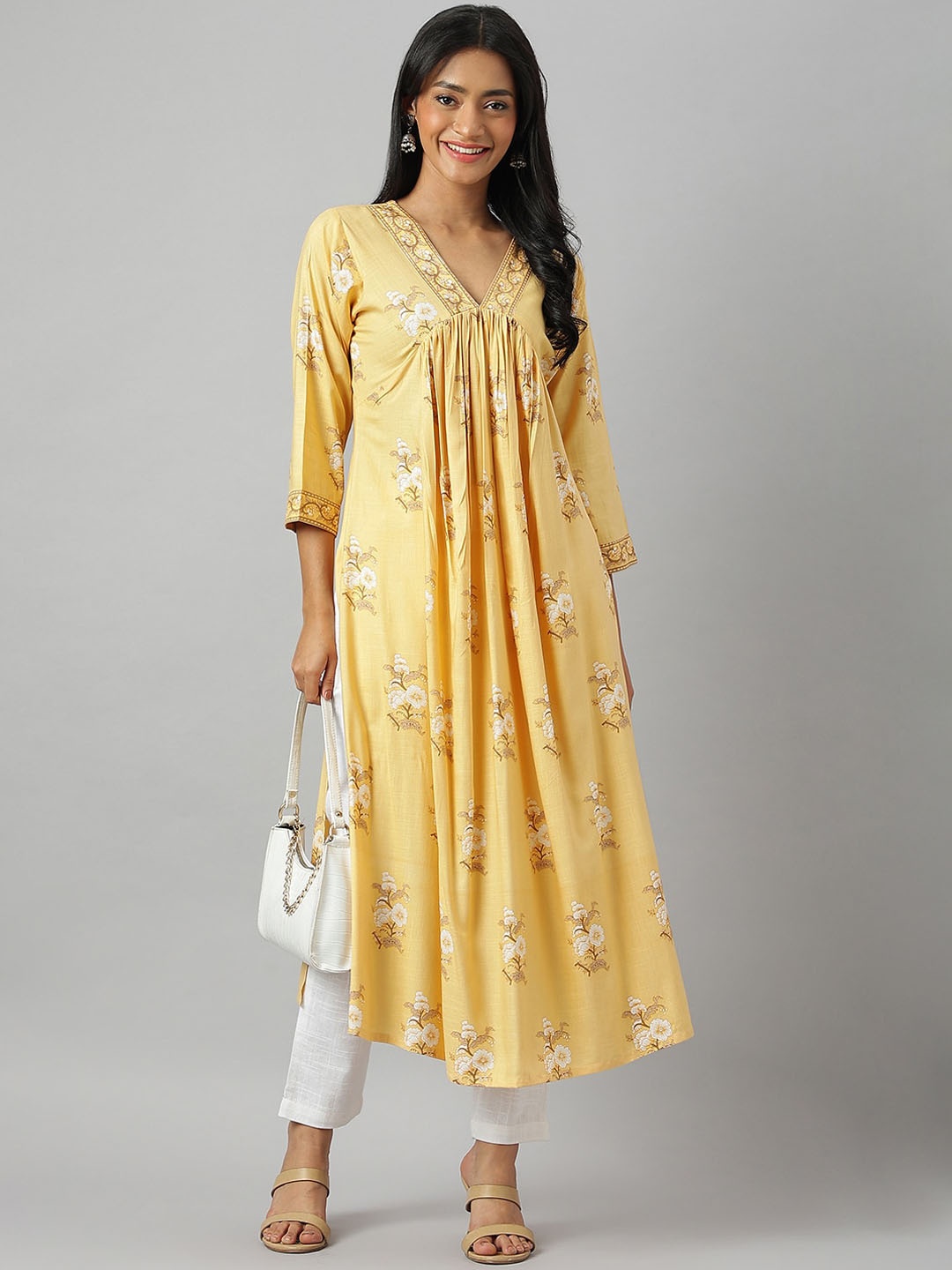 

RATAN Floral Screen Printed Empire Straight Kurta, Yellow