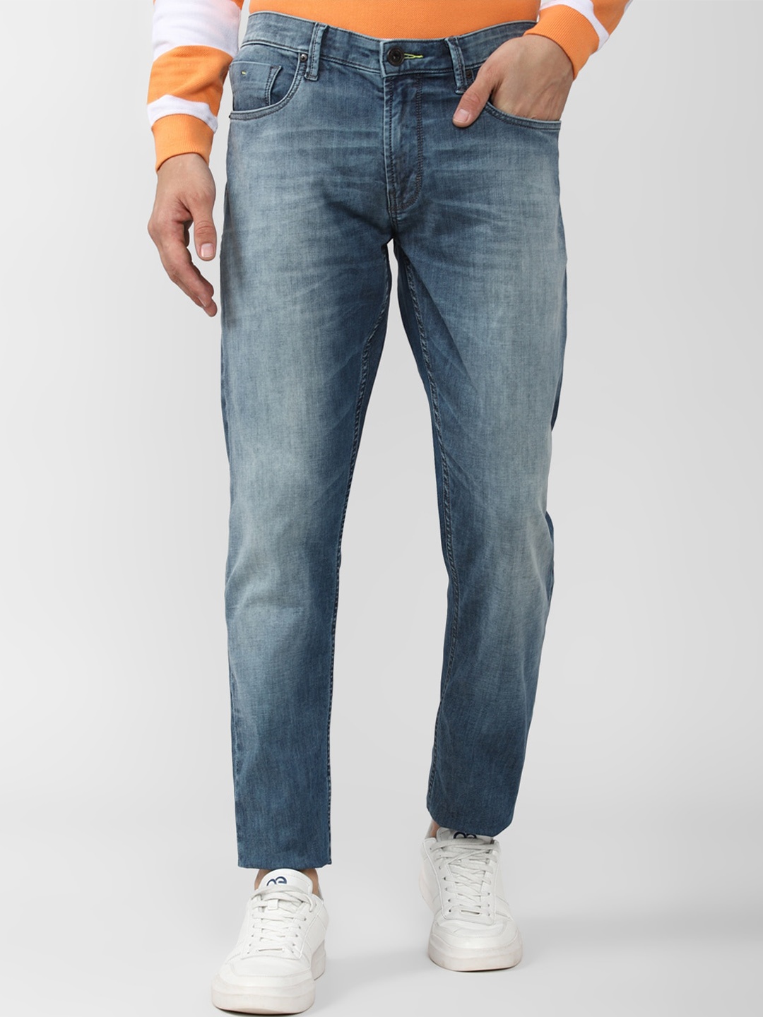 

Peter England Casuals Men Slim Fit Heavy Fade Clean Look Jeans, Blue