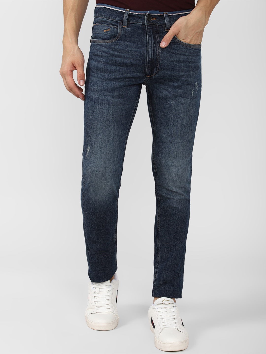 

Peter England Casuals Men Slim Fit Low Distress Light Fade Jeans, Navy blue