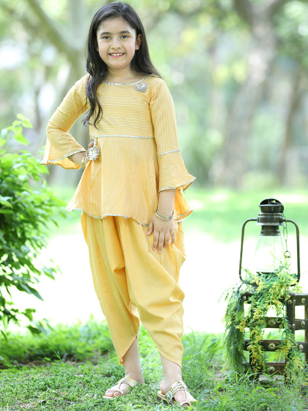 

Cutiekins Girls Striped Bell Sleeves Gotta Patti Kurti With Dhoti Pants, Mustard