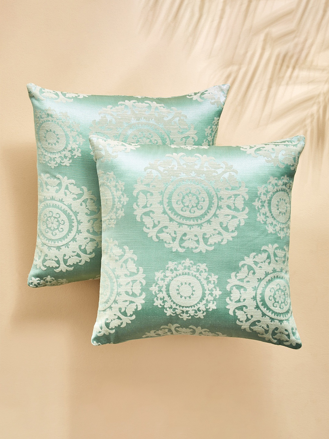 

Home Centre Teal & White 2 Pieces Ethnic Motifs Square Cushion Covers