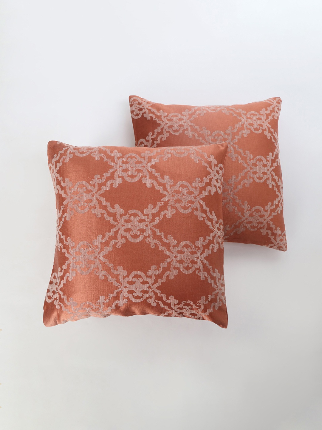 

Home Centre Orange & Beige 2 Pieces Ethnic Motifs Square Cushion Covers