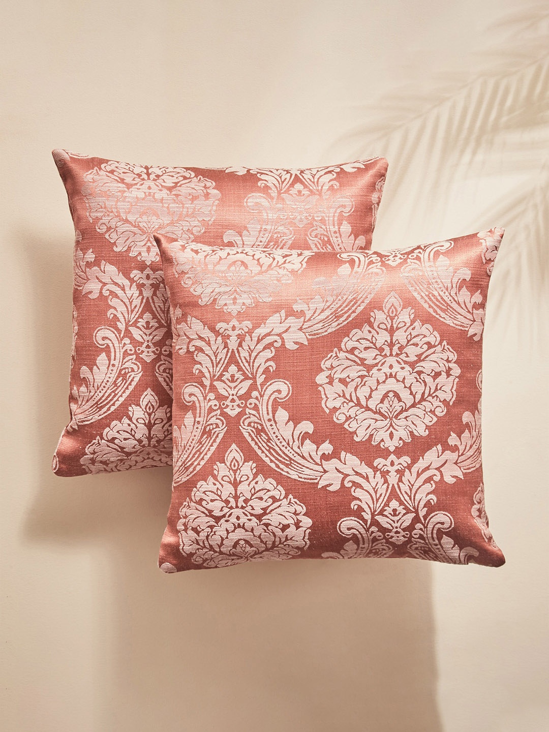 

Home Centre Orange & White 2 Pieces Ethnic Motifs Square Cushion Covers