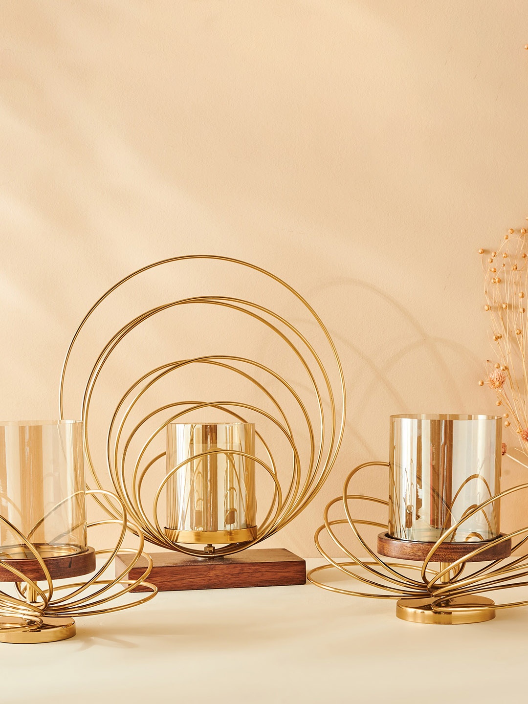 

Home Centre Gold Toned Butterfly Ring Hurricane Candle Holder