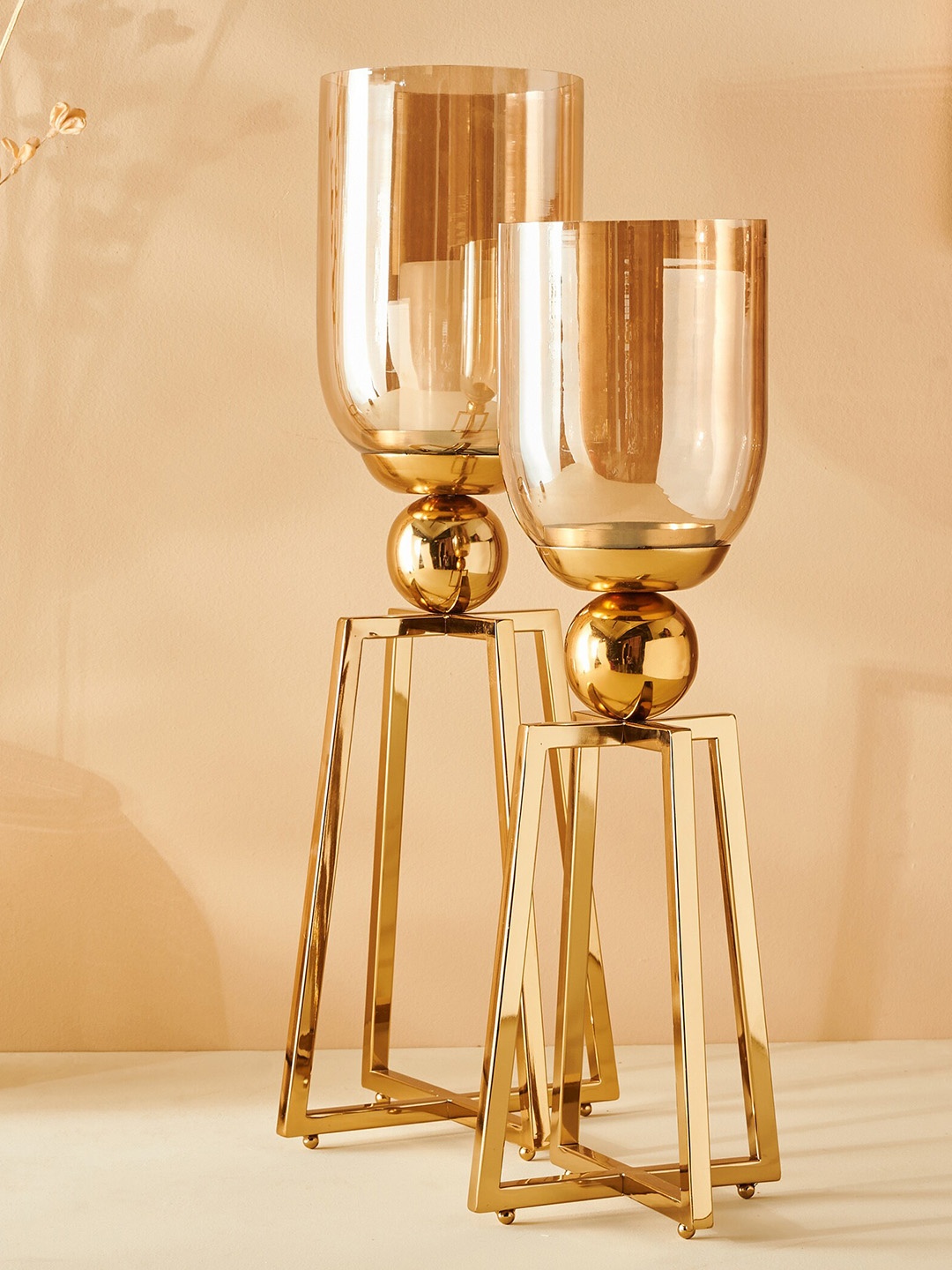 

Home Centre Gold Toned Splendid-Dastkari Steel Hurricane Candle Holder With Stand