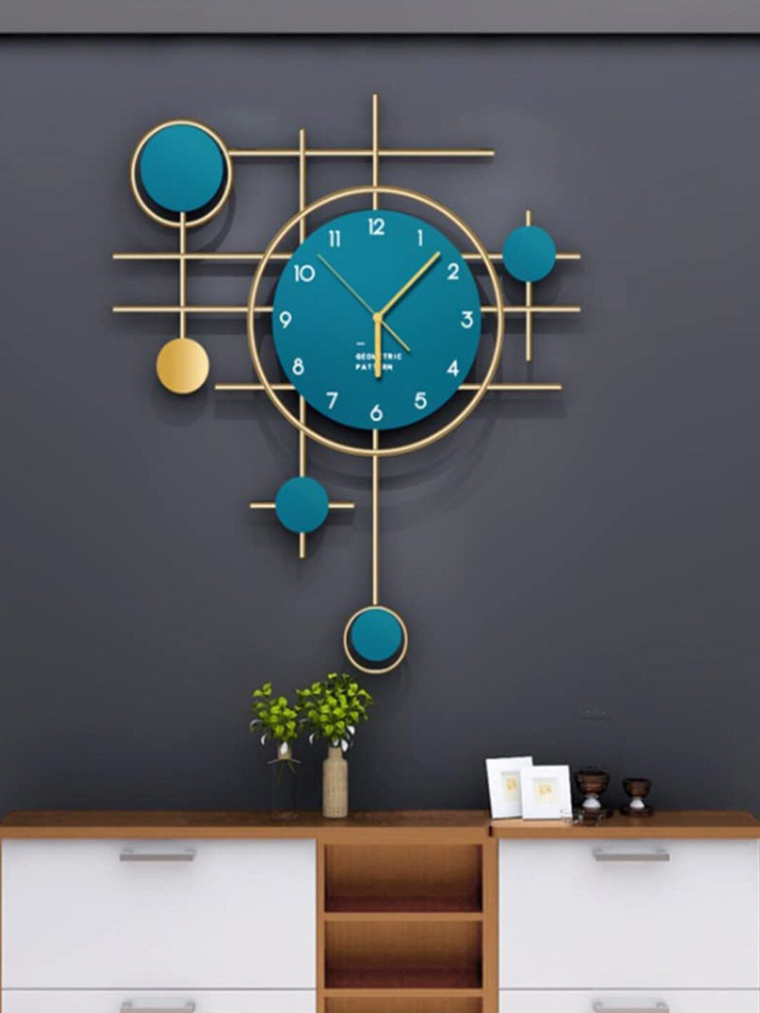 

The Art House Blue & Gold-Toned Analogue Abstract Shaped Contemporary Wall Clock