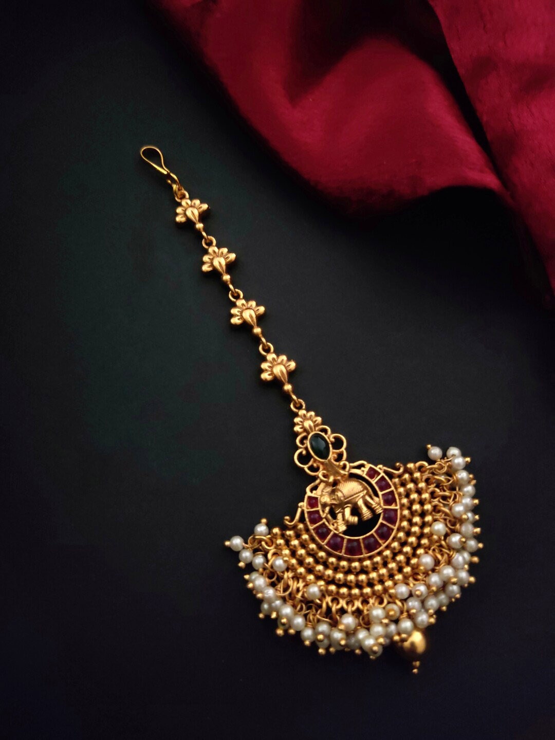 

Pihtara Jewels Gold-Plated Stone-Studded Elephant Motif Designed Copper Maang Tikka