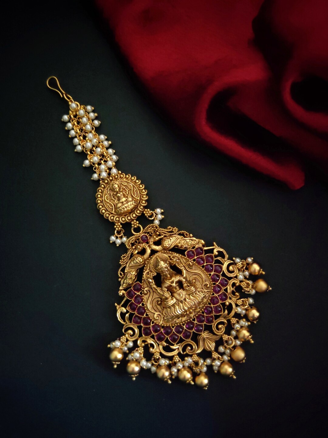 

Pihtara Jewels Gold-Plated Stone-Studded Temple Motif Designed Copper Maang Tikka