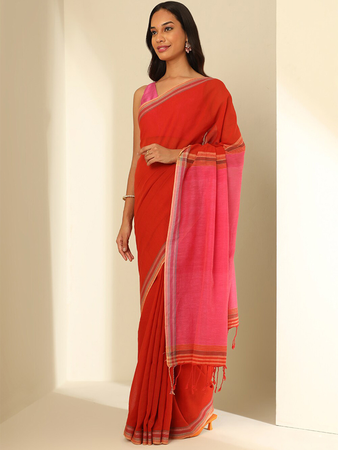 

Taneira Solid Pure Cotton Saree, Orange
