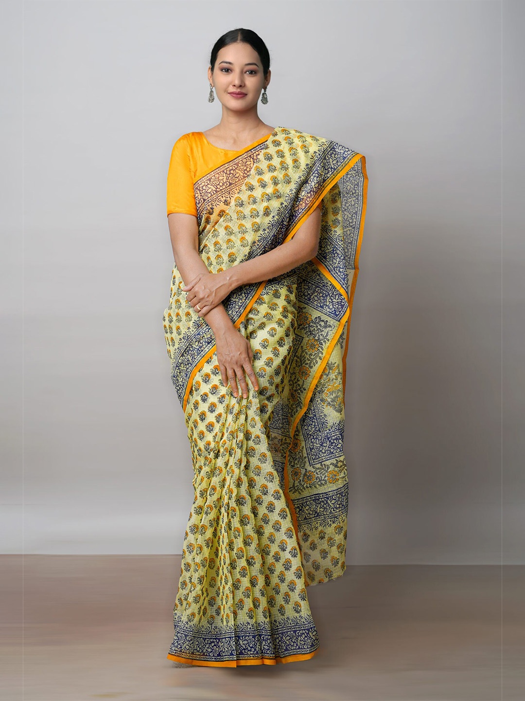 

Unnati Silks Ethnic Motifs Printed Handloom Pure Cotton Kota Saree, Yellow