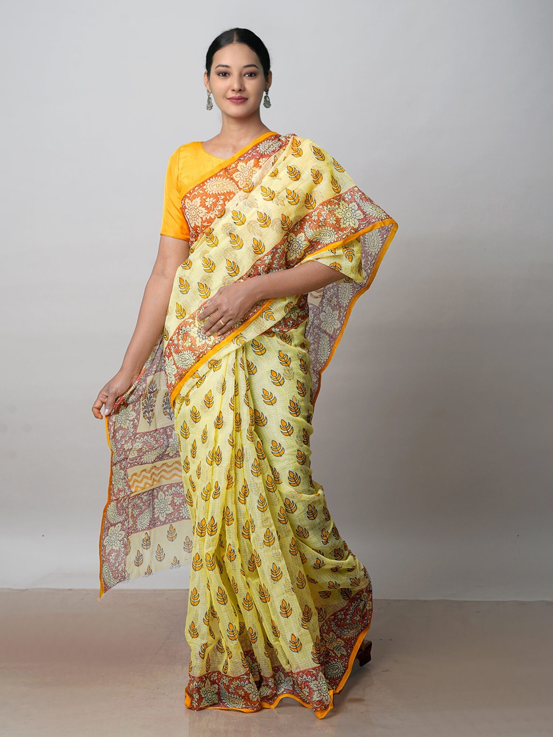 

Unnati Silks Ethnic Motifs Printed Pure Cotton Kota Saree, Yellow