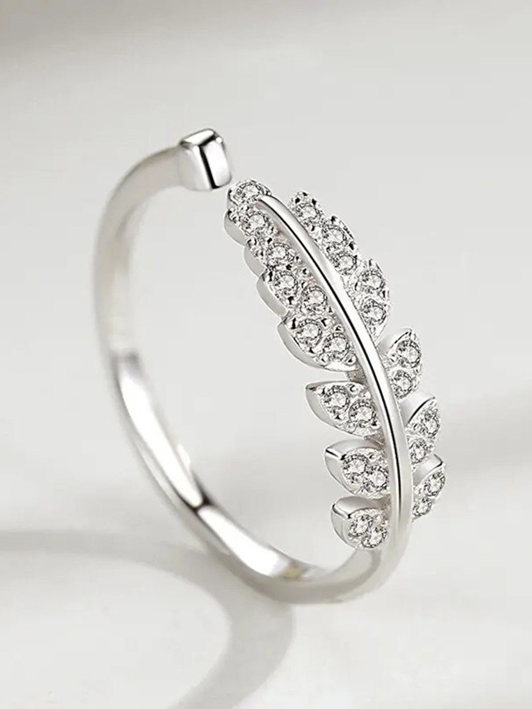 

MEENAZ Silver-Plated American Diamond-Studded Leaf Shaped Stainless Steel Finger Ring