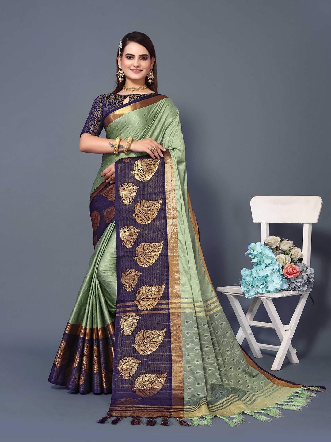 

Mitera Green & Blue Ethnic Motifs Woven Design Zari Silk Cotton Banarasi Saree
