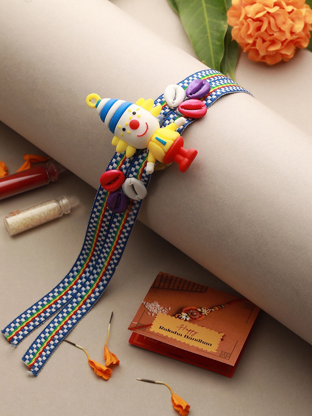 

Saraf RS Jewellery Kids Clown Shaped Designer Ribbon Rakhi, Blue