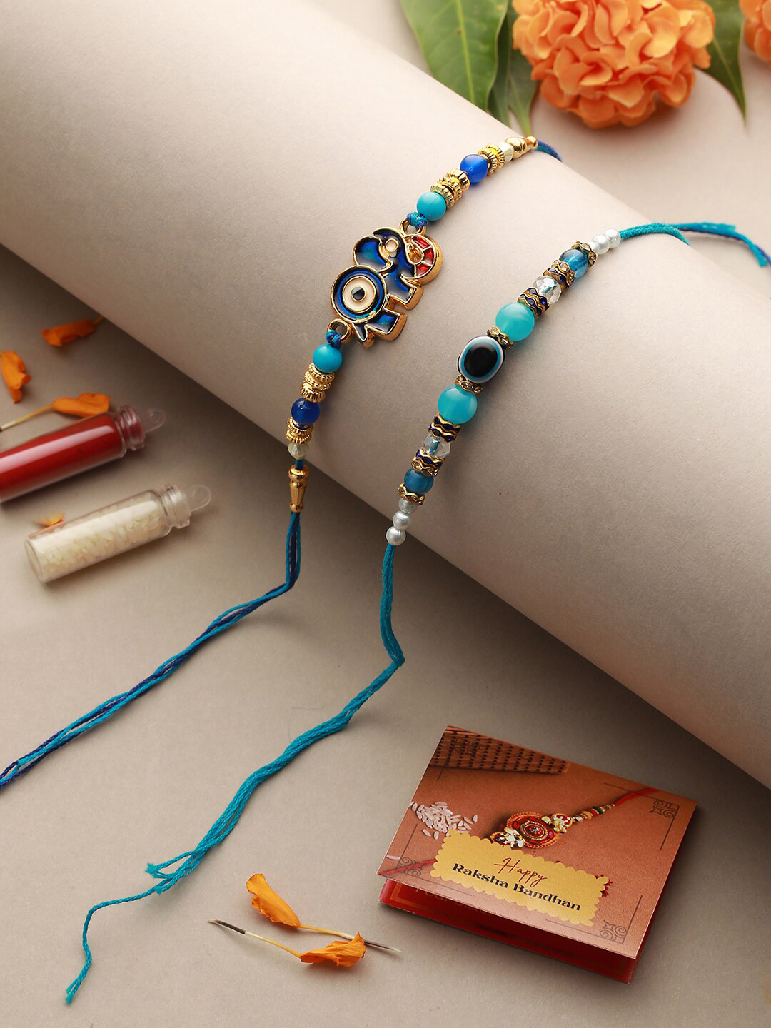 

Saraf RS Jewellery Set Of 2 Evil Eye Rakhi With Roli Chawal, Blue