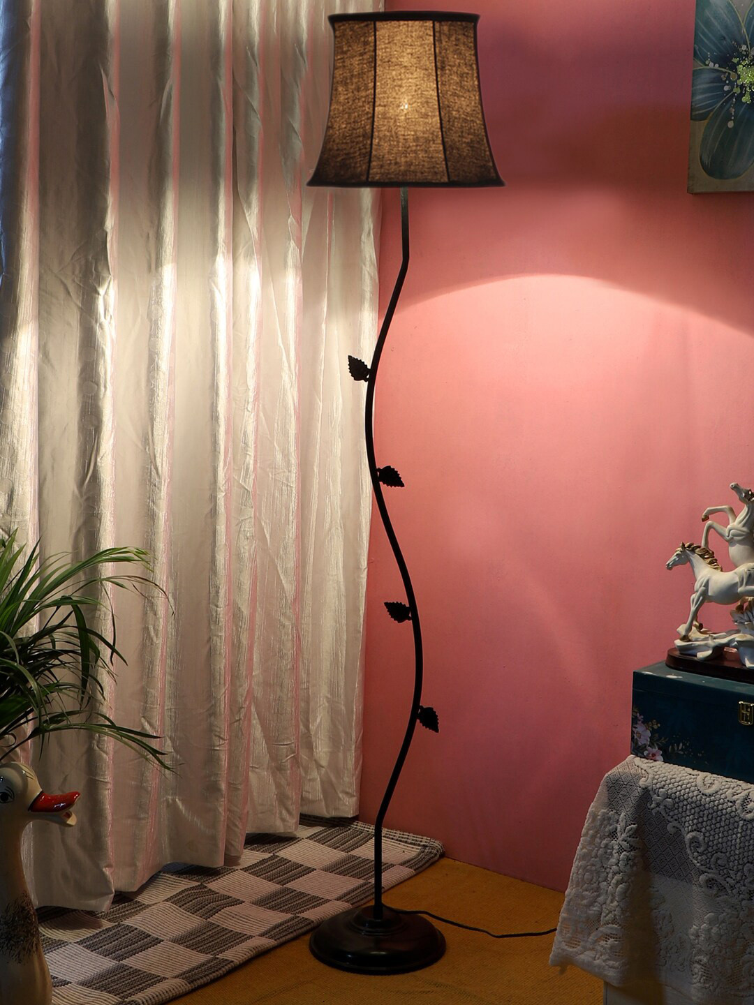 

Devansh Black Textured Curvy Floor Lamp