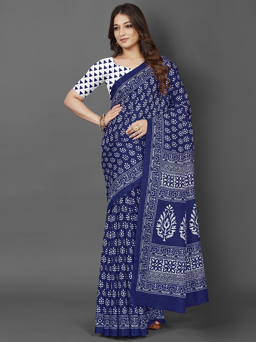 

Mitera Blue & White Ethnic Motifs Printed Dabu Saree