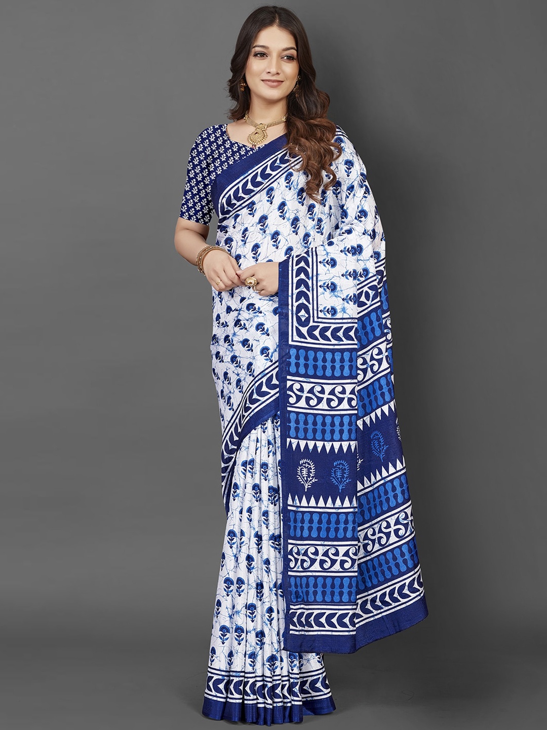 

Mitera White & Blue Ethnic Motifs Printed Dabu Saree